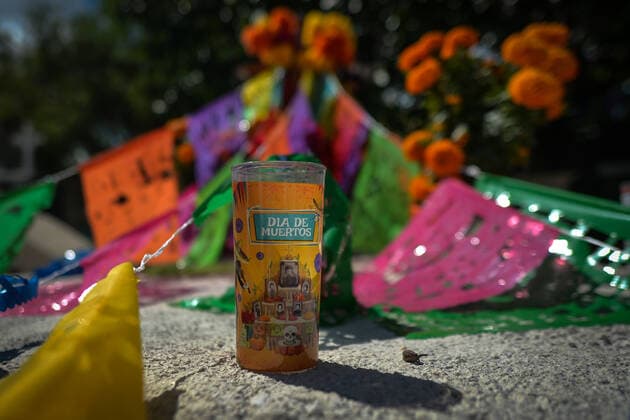 Day Of The Dead In Playa Del Carmen A decorated grave seen on the Day of the Dead (in Spanish: Dia de Muertos) in the municipal cemetery of Playa del Carmen. All Saints Day in Mexico coincides with the first day of the Day of the Dead (Dia de Muertos) celebration. It commemorates children who have died (Dia de los Inocentes) and the second day celebrates all deceased adults. In 2008, the tradition was inscribed in the Representative List of the Intangible Cultural Heritage of Humanity by UNESCO. On Tuesday, 2 November 2021, in Playa Del Carmen, Quintana Roo, Mexico. Playa Del Carmen Mexico  Copyright: xArturxWidakx widak-dayofthe211102_np8ho