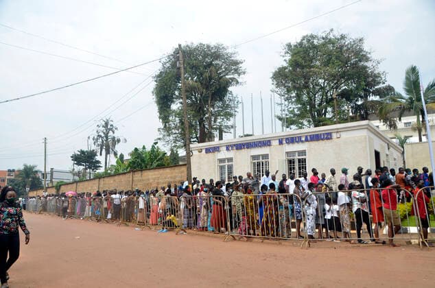 (211106) -- KAMPALA, Nov. 6, 2021 -- People line up to receive the COVID-19 vaccine during mass vaccination in Kampala, Uganda, on Nov. 6, 2021. (Photo by Xinhua) UGANDA-KAMPALA-COVID-19-MASS VACCINATION NicholasxKajoba 