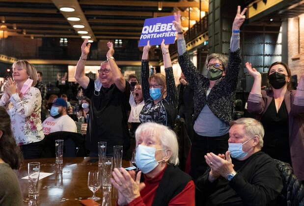 November 7, 2021, QUEBEC, PQ, Canada: Supporters of Bruno Marchand of the Forte et Fiere party react as their candidate passes Marie Josee Savard in the results at the municipal election of Quebec City, in Quebec City, Sunday, Nov. 7, 2021. QUEBEC Canada  - ZUMAc35_ 20211107_zaf_c35_113 Copyright: xJacquesxBoissinotx