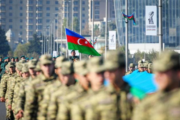 Azerbaijan Armenia Nagorno-Karabakh Conflict Anniversary 6691418 08.11.2021 Servicemen take part in celebrations marking the anniversary of the end of the 2020 military conflict over the Nagorno-Karabakh region, in Baku, Azerbaijan. Azerbaijan on Monday is celebrating the one-year anniversary of the capture of the city of Shusha, the battle that led to its defeat of Armenia in last year?s war. Murad Orujov Sputnik Baku Azerbaijan  Copyright: xMuradxOrujovx