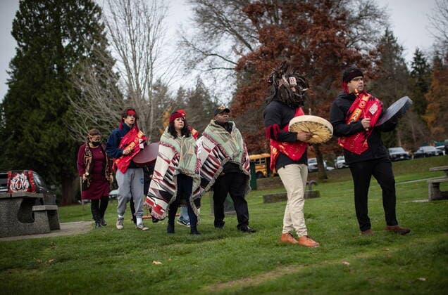 November 8, 2021, North Vancouver, BC, Canada: Drummers lead Pfc. Celina Dorame, third left, a Tsleil-Waututh Nation member who was born in California and served with the U.S. Army, and Sgt. Michael Wilson, fourth left, a U.S. Army veteran from New Convert, Ala., who served in the Gulf War and is married to Tsleil-Waututh Nation Chief Leah George-Wilson, during a ceremony held by the First Nation to mark Indigenous Veterans Day, in North Vancouver, B.C., Monday, Nov. 8, 2021. Veterans Affairs Canada estimates that more than 12,000 First Nations, Inuit and Metis served during the First and Second World Wars and the Korean War. North Vancouver Canada - ZUMAc35_ 20211108_zaf_c35_111 Copyright: xDarrylxDyckx