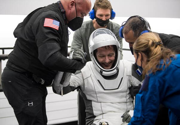 November 8, 2021, Pensacola, Florida, USA: ESA (European Space Agency) astronaut Thomas Pesquet is helped out of the SpaceX Crew Dragon Endeavour spacecraft onboard the SpaceX GO Navigator recovery ship after he and NASA astronauts Shane Kimbrough and Megan McArthur, and Japan Aerospace Exploration Agency (JAXA) astronaut Aki Hoshide landed in the Gulf of Mexico off the coast of Pensacola, Florida, Monday, Nov. 8, 2021. NASA™s SpaceX Crew-2 mission is the second operational mission of the SpaceX Crew Dragon spacecraft and Falcon 9 rocket to the International Space Station as part of the agency™s Commercial Crew Program. .Mandatory Credit: NASA via CNP Pensacola USA - ZUMAs152 20211108_zaa_s152_084 Copyright: xAubreyxGemignanix