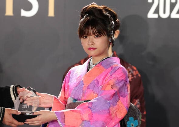 November 9, 2021, Tokyo, Japan - Japanese tiktokerHina Kagei displays kimono as she receives the first Kimonoist award for the promotion of Japanese traditional dresses in Tokyo on Tuesday, November 9 2021.  (173989339)