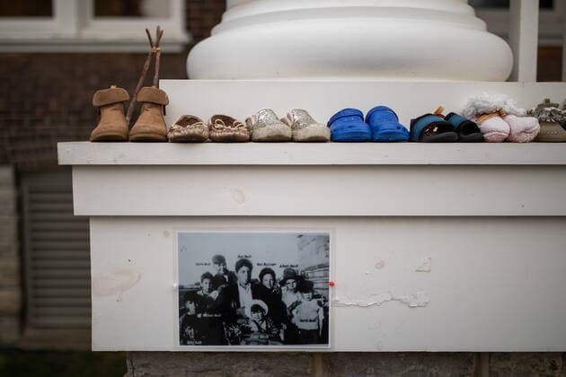 November 9, 2021, Brantford, ON, Canada: Childrens shoes seen at the site of former Indian Residential School, the Mohawk Institute, as phase one of a ground search begins for unmarked graves on the 500 acres of the lands in Brantford, Ont., Tuesday, November 9, 2021. Brantford Canada - ZUMAc35_ 20211109_zaf_c35_017 Copyright: xNickxIwanyshynx