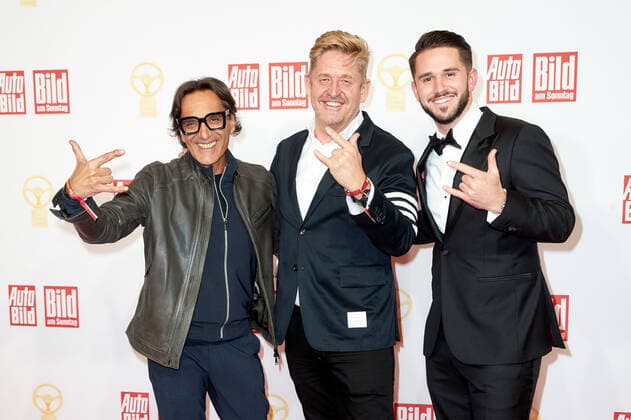 The Golden Steering Wheel 2021 Antonino Labate Director of Strategy, Business Development Operation CUPRA , Wayne Griffiths Chairman of the Board SEAT S A and racing driver Daniel Abt on the red carpet at the Golden Steering Wheel award ceremony at the Axel Springer Tower in Berlin Copyright: xEventpressxGolejewskix