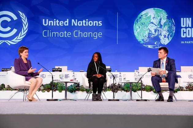 Berühmte Feministinnen, Vanessa Nakate Day 11 Of COP26 UN Climate Conference In Glasgow (L-R) Nicola Sturgeon, First Minister of Scotland, youth activist Vanessa Nakate and High Level Climate Champions Nigel Topping speak during Global Climate Action High-Level Event: Racing To a Better World in Plenary Cairn Gorm in the COP26 venue - Scottish Event Campus during the twelfth day of the COP26 UN Climate Change Conference, held by UNFCCC in Glasgow, Scotland on November 11, 2021. COP26, running from October 31 to November to 12 in Glasgow, is the most significant climate conference since the 2015 Paris summit as the nations are expected to set new greenhouse gas emission targets in order to slow the global warming, as well as firming up other key commitments. Glasgow Scotland Uni  Copyright: xDominikaxZarzyckax zarzycka-day11ofc211111_npiO1