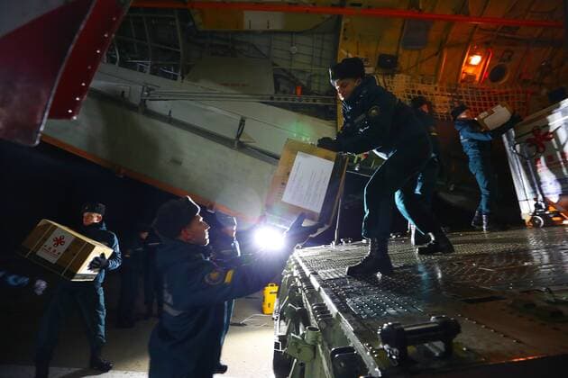 (211112) -- MINSK, Nov. 12, 2021 -- Chinese vaccines and medical supplies are unloaded from a plane at an airport in Minsk, Belarus, Nov. 11, 2021. China and Belarus signed a document on vaccine transfer after a new batch of coronavirus vaccines from China arrived here Thursday. (Photo by Xinhua) BELARUS-MINSK-COVID-19-CHINA-VACCINE HenadzxZhinkov 