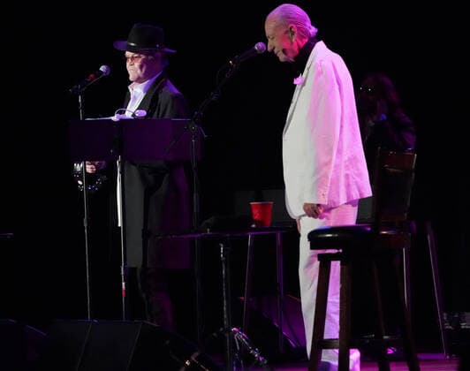 November 15, 2021, Los Angeles, CA, USA: Musician-Actors-MICHAEL NESMITH and MICKY DOLENZ on stage together for the last time as they wrapped up the Monkees 2021 Farewell Tour at the Greek Theater, Los Angeles, CA, USA, November 14, 2021. his farewell tour will mark the end of a unique project that began in 1965 when four young men were cast in a television show about a struggling rock band that was inspired by the BeatlesÃ¢â‚¬â ¢ A Hard DayÃ¢â‚¬â ¢s Night. Few could have predicted the impact The Monkees would have on music and pop culture at large, one that still reverberates more than 50 years later...Formed in Los Angeles for the eponymous television series, the quartet of Dolenz, Nesmith, the late Peter Tork and the late Davy Jones bro - ZUMAmt3_ 20211115_zaf_mt3_009 Copyright: xScottxMitchellx