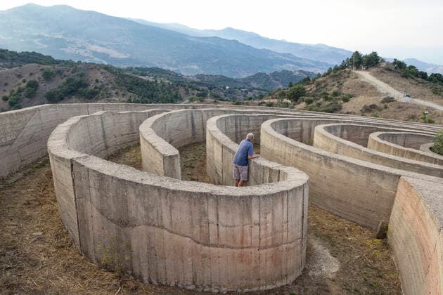 Italy, Sicily, Tusa, Fiumara d™Arte art park, senior man inside Labirinto di Arianna maze model released, MAM00645