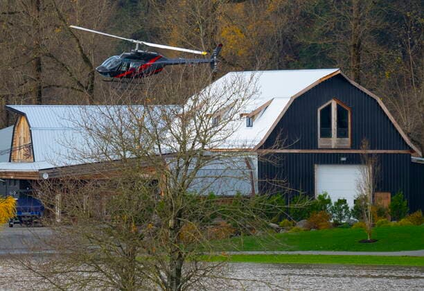 November 16, 2021, CHILLIWACK, BC, CANADA: A helicopter takes off from a farm surrounded by flood waters in Chilliwack, B.C., Tuesday, November 16, 2021. CHILLIWACK CANADA  - ZUMAc35_ 20211116_zaf_c35_027 Copyright: xJonathanxHaywardx