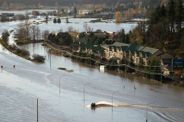 November 16, 2021, ABBOTSFORD, BC, Canada: A boat speeds along a flooded highway 1 in Abbotsford, B.C., Tuesday, Nov. 16, 2021. ABBOTSFORD Canada  - ZUMAc35_ 20211116_zaf_c35_095 Copyright: xJonathanxHaywardx