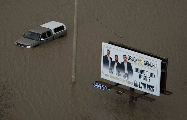 November 16, 2021, ABBOTSFORD, BC, Canada: A truck is stranded along a flooded highway 1 in Abbotsford, B.C., Tuesday, Nov. 16, 2021. ABBOTSFORD Canada  - ZUMAc35_ 20211116_zaf_c35_097 Copyright: xJonathanxHaywardx