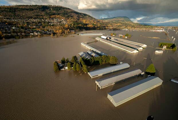 November 16, 2021, ABBOTSFORD, BC, Canada: Rising flood waters are seen surrounding barns in Abbotsford, B.C., Tuesday, Nov. 16, 2021. ABBOTSFORD Canada  - ZUMAc35_ 20211116_zaf_c35_110 Copyright: xJonathanxHaywardx
