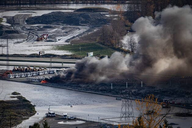 November 17, 2021, ABBOTSFORD, BC, CANADA: Recreational vehicles and trucks burn during a fire at a business surrounded by floodwaters in Abbotsford, B.C., on Wednesday, November 17, 2021. ABBOTSFORD CANADA  - ZUMAc35_ 20211117_zaf_c35_037 Copyright: xDarrylxDyckx