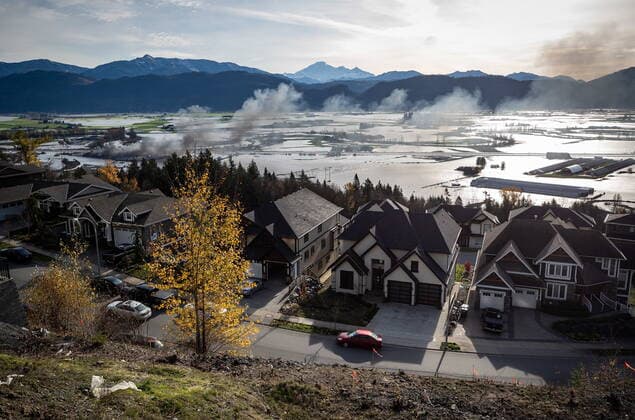 November 17, 2021, ABBOTSFORD, BC, CANADA: Recreational vehicles and trucks burn during a fire at a business surrounded by floodwaters in Abbotsford, B.C., on Wednesday, November 17, 2021. ABBOTSFORD CANADA  - ZUMAc35_ 20211117_zaf_c35_050 Copyright: xDarrylxDyckx