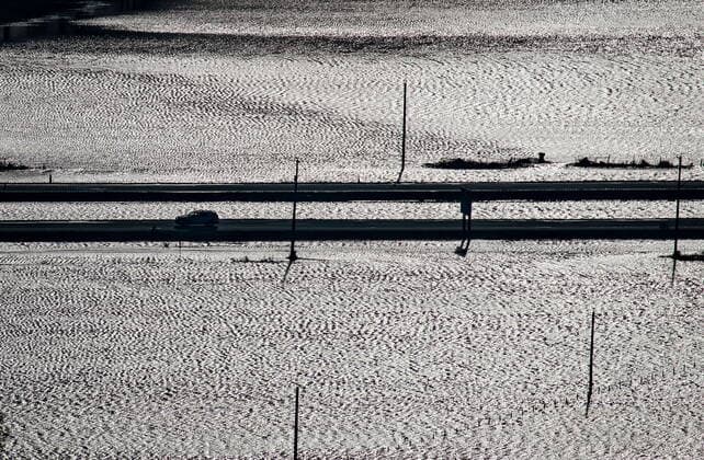November 17, 2021, ABBOTSFORD, BC, CANADA: Surrounded by floodwaters, a police vehicle travels on the Trans-Canada Highway in Abbotsford, B.C., on Wednesday, November 17, 2021. ABBOTSFORD CANADA  - ZUMAc35_ 20211117_zaf_c35_055 Copyright: xDarrylxDyckx