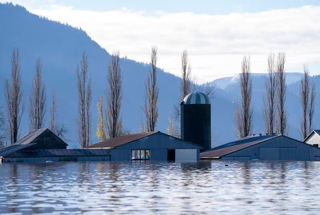 November 19, 2021, Chilliwack, BC, Canada: A farm submerged by flood waters caused by heavy rains and mudslides earlier in the week is pictured in Sumas Prairie near Chilliwack, B.C., Friday, Nov. 19, 2021. Chilliwack Canada  - ZUMAc35_ 20211119_zaf_c35_086 Copyright: xJonathanxHaywardx