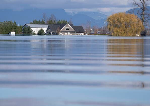 November 19, 2021, Chilliwack, BC, Canada: A home is surrounded by flood waters caused by heavy rains and mudslides earlier in the week is pictured throughout Sumas Prairie near Chilliwack, B.C., Friday, Nov. 19, 2021. Chilliwack Canada  - ZUMAc35_ 20211119_zaf_c35_100 Copyright: xJonathanxHaywardx
