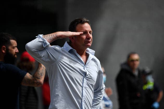 COVID19 FREEDOM RALLY MELBOURNE, A man salutes during The Worldwide Rally for Freedom protest against mandatory vaccinations and lockdown measures in Melbourne, Saturday, November 20, 2021. The Worldwide Rally for Freedom is a day of rallies purportedly for freedom across many countries, including Australia. ( NO ARCHIVING, EDITORIAL USE ONLY, NO USE IN BOOKS WITHOUT CONSENT MELBOURNE VIC AUSTRALIA  Copyright: xJOELxCARRETTx 20211120001598409601