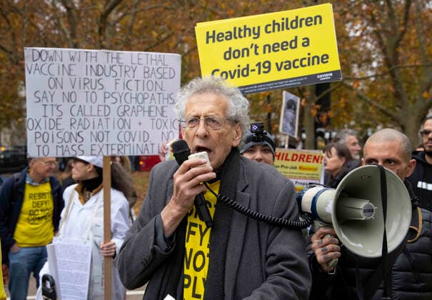 . 20 11 2021. London, United Kingdom. Piers Corbyn is one of the spokesmen for the anti vaxx movement. Thousands of people opposed to the vaccine demonstrate in central London. They are opposed to the vaccine and strogly believe that children should not be forced to have it.Austria has just announced it is having a national lockdown from Tuesday. Anti Vaxx demonstration.  xMarkxThomasx xi-Imagesx IIM-22829-0042