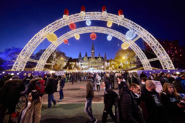 (211120) -- VIENNA, Nov. 20, 2021 -- People visit a Christmas market in Vienna, Austria, on Nov. 20, 2021. To curb the COVID-19 pandemic, the Austrian government announced a nationwide lockdown beginning from Nov. 22. (Photo by Xinhua) AUSTRIA-VIENNA-COVID-19-MEASURES GeorgesxSchneider 