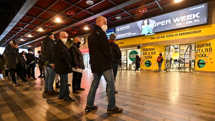 People wait in front of the vaccination center in the Main Railway Station in Prague, Czech Republic, November 20. 2021. (CTKxPhoto MichalxKamaryt) CTKPhotoP2021112104155 