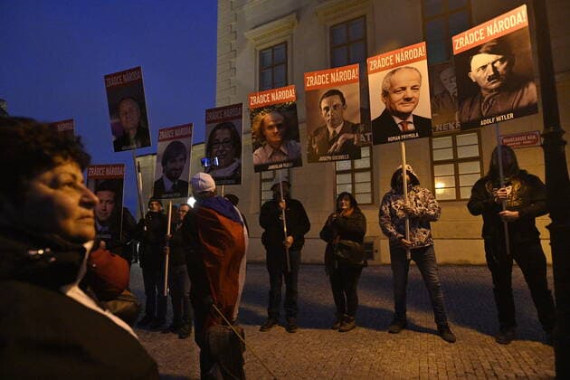 People joined a march against the government COVID-19 restrictions organised by the We Will Open Czechia-Dog Croaked movement in Prague, Czech Republic, November 22, 2021. (CTKxPhoto MichalxKamaryt) CTKPhotoP2021112207028 