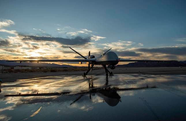 STYLELOCATIONA U.S. Air Force MQ-9 Reaper unmanned aerial vehicle is silhouetted by the setting sun on the ground at Creech Air Force Base, November 17, 2020 near Las Vegas, Nevada. Indian Springs United States of America - ZUMAp138 20201117_zaa_p138_008 Copyright: xSsgt.xLaurenxSilverthorne UsxAirx