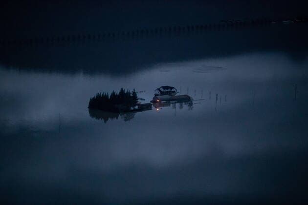 November 22, 2021, ABBOTSFORD, BC, CANADA: A house and a barn are surrounded by floodwaters on a farm at dusk in Abbotsford, B.C., on Monday, November 22, 2021. ABBOTSFORD CANADA  - ZUMAc35_ 20211122_zaf_c35_121 Copyright: xDarrylxDyckx