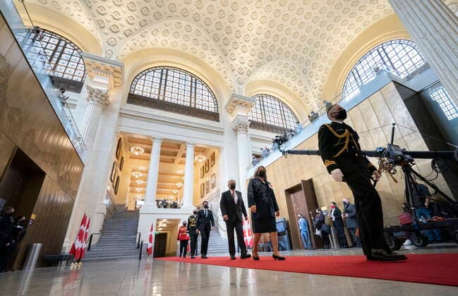November 23, 2021, Ottawa, ON, CAN: Gov. Gen. Mary Simon walks with her husband Whit Fraser, and Prime Minister Justin Trudeau through the foyer of the Senate of Canada building before delivering the Speech from the Throne in Ottawa, on Tuesday, Nov. 23, 2021. Ottawa CAN  - ZUMAc35_ 20211123_zaf_c35_055 Copyright: xJustinxTangx