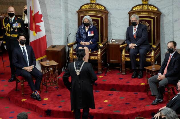 November 23, 2021, Ottawa, ON, Canada: Prime Minister Justin Trudeau, left to right, Gov. Gen. Mary Simon and her husband Whit Fraser look on as the Usher of the Black J. Greg Peters presents himself to the throne ahead of the Throne Speech in the Senate in Ottawa on Tuesday, Nov. 23, 2021. Ottawa Canada  - ZUMAc35_ 20211123_zaf_c35_063 Copyright: xAdrianxWyldx