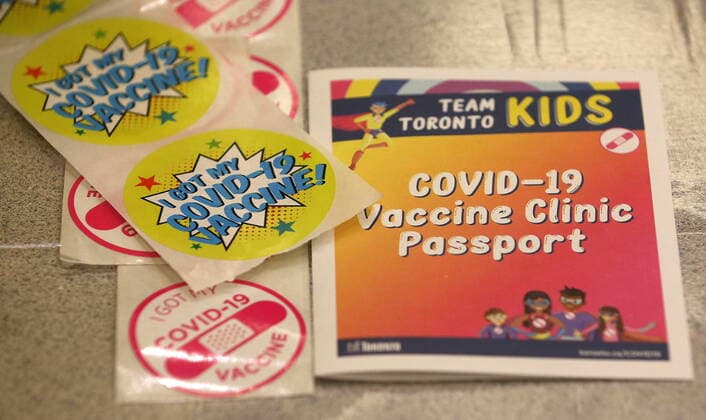 November 23, 2021, Toronto, on, Canada: Children who are part of the Hospital for Sick Children family between the ages of 5 and 11 years of age are some of the first to get vaccinated for COVID-19 at the Metro Toronto Convention Centre, in Toronto, Tuesday, Nov. 23, 2021. Toronto Canada  - ZUMAc35_ 20211123_zaf_c35_255 Copyright: xStevexRussellx