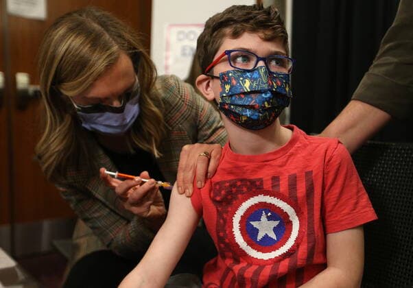 November 23, 2021, Toronto, on, Canada: Children who are part of the Hospital for Sick Children family between the ages of 5 and 11 years of age are some of the first to get vaccinated for COVID-19 at the Metro Toronto Convention Centre, in Toronto, Tuesday, Nov. 23, 2021. Toronto Canada  - ZUMAc35_ 20211123_zaf_c35_259 Copyright: xStevexRussellx