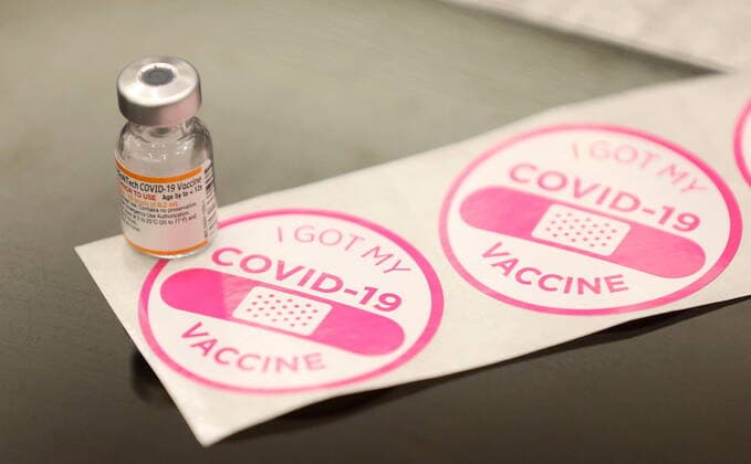 November 23, 2021, Toronto, on, Canada: The first vial of paediatric COVID-19 vaccine used in Toronto. Children who are part of the Hospital for Sick Children family between the ages of 5 and 11 years of age are some of the first to get vaccinated for COVID-19 at the Metro Toronto Convention Centre, in Toronto, Tuesday, Nov. 23, 2021. Toronto Canada  - ZUMAc35_ 20211123_zaf_c35_265 Copyright: xStevexRussellx