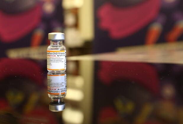 November 23, 2021, Toronto, on, Canada: The first vial of paediatric COVID-19 vaccine used in Toronto. Children who are part of the Hospital for Sick Children family between the ages of 5 and 11 years of age are some of the first to get vaccinated for COVID-19 at the Metro Toronto Convention Centre, in Toronto, Tuesday, Nov. 23, 2021. Toronto Canada  - ZUMAc35_ 20211123_zaf_c35_273 Copyright: xStevexRussellx