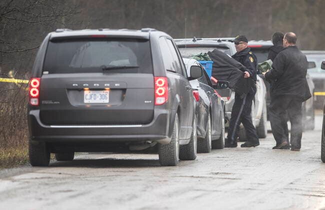 November 25, 2021, KAWARTHA LAKES, ONT, CANADA: Ontario Provincial Police forensic officers attend a rural shooting scene on Devitts Road, in the City of Kawartha Lakes, Ont., on Thursday, November 25, 2021. The OPP Special Investigations Unit is investigating as a Kawartha Lakes OPP officer discharged his weapon during the incident. One man who has not been identified was pronounced deceased at the scene. KAWARTHA LAKES CANADA  - ZUMAc35_ 20211125_zaf_c35_099 Copyright: xFredxThornhillx