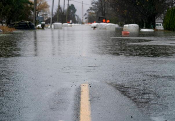 November 25, 2021, ABBOTSFORD, BC, CANADA: A flooded road is pictured in Abbotsford, B.C., Thursday, November 25, 2021. ABBOTSFORD CANADA  - ZUMAc35_ 20211125_zaf_c35_124 Copyright: xJonathanxHaywardx