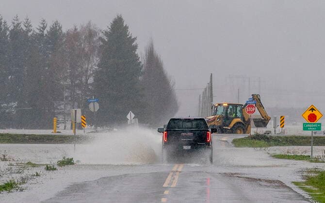 November 25, 2021, ABBOTSFORD, BC, CANADA: A truck drives along the flooded roads of Abbotsford, B.C., Thursday, November 25, 2021. ABBOTSFORD CANADA  - ZUMAc35_ 20211125_zaf_c35_125 Copyright: xJonathanxHaywardx