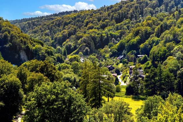 Panoramic view of Pradnik creek valley with Ojcow village and wooded Jurassic limestone mountains of Cracow-Czestochowa upland in Lesser Poland  BEW1DDC3F88