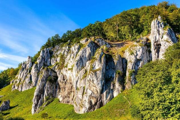 Crown rocks - Skaly Koronne - Jurassic limestone mountain massif with Glove Rock - Rekawica - in Pradnik creek valley of Cracow-Czestochowa upland in Lesser Poland  BEW1DDC3F8B