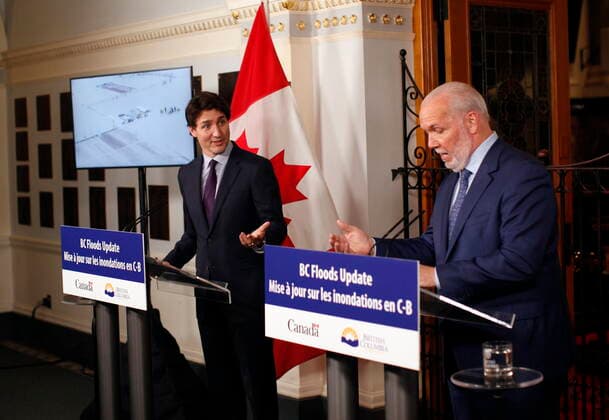 November 26, 2021, VICTORIA, BC, CANADA: Prime Minister Justin Trudeau and Premier John Horgan talk to media about the recent flooding in the province at the legislature during a press conference in Victoria, B.C., on Friday, November 26, 2021. VICTORIA CANADA  - ZUMAc35_ 20211126_zaf_c35_240 Copyright: xChadxHipolitox