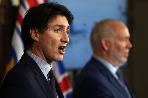 November 26, 2021, VICTORIA, BC, CANADA: Prime Minister Justin Trudeau and Premier John Horgan talk to media about the recent flooding in the province at the legislature during a press conference in Victoria, B.C., on Friday, November 26, 2021. VICTORIA CANADA  - ZUMAc35_ 20211126_zaf_c35_249 Copyright: xChadxHipolitox