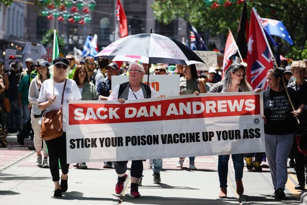November 27, 2021, Melbourne, Victoria, Australia: Protesters march in the central business district of Melbourne, Australia against proposed state government legislation governing pandemic management powers and vaccine mandates. Melbourne Australia - ZUMAl303 20211127_zaf_l303_010 Copyright: xSydneyxLowx