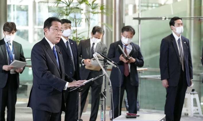 Japan PM Kishida on border controls over omicron variant Japanese Prime Minister Fumio Kishida speaks to reporters at his office in Tokyo on Nov. 29, 2021, about border controls to keep out the new Omicron variant of the coronavirus.  A14AA0001150007P