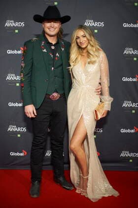 November 29, 2021, London, on, Canada: Jade Eagleson and his wife Marina Paquin pose for photographers on the red carpet at the Canadian Country Music Awards in London, Ont., Monday, Nov. 29, 2021. London Canada  - ZUMAc35_ 20211129_zaf_c35_092 Copyright: xGeoffxRobinsx