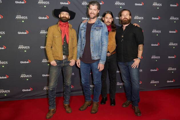 November 29, 2021, London, on, Canada: Tim and The Glory Boys pose for photographers on the red carpet at the Canadian Country Music Awards in London, Ont., Monday, Nov. 29, 2021. London Canada  - ZUMAc35_ 20211129_zaf_c35_102 Copyright: xGeoffxRobinsx