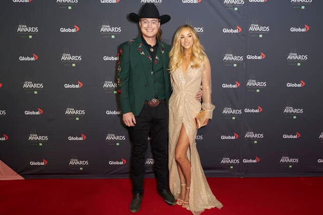 November 29, 2021, London, on, Canada: Jade Eagleson and his wife Marina Paquin pose for photographers on the red carpet at the Canadian Country Music Awards in London, Ont., Monday, Nov. 29, 2021. London Canada  - ZUMAc35_ 20211129_zaf_c35_104 Copyright: xGeoffxRobinsx