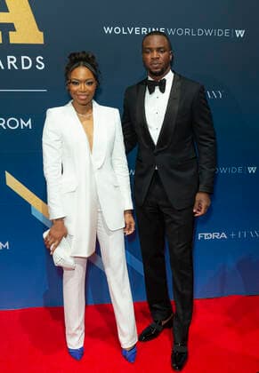 NY: 2021 FN Achievement Awards Titi Adesanya wearing dress by Alexander McQueen and Jimi Adesanya attend 2021 Footwear News Acheivement Awards at Casa Cipriani South Seaport New York New York United States Copyright: LevxRadin