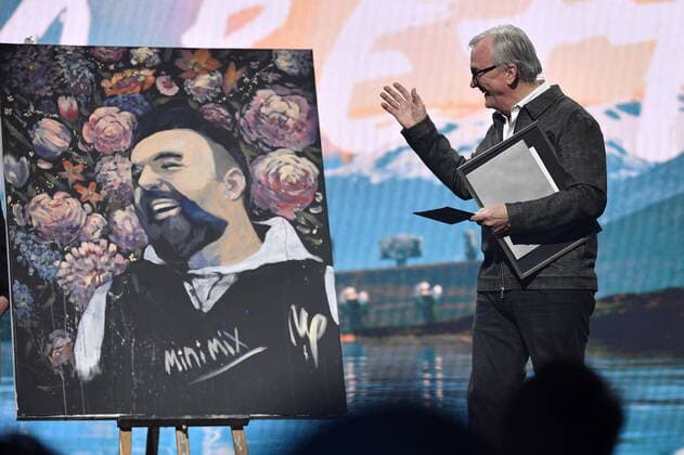 Tim Avicii Bergling s father Klas Bergling with a painting of Mohammed Ali from the leisure center Minimix in Hammarkullen in Gothenburg, which received the newly established annual prize from the Tim Berglind Foundation of SEK 50,000 and a painting by the artist Maxi Svensson Together For A Better Day  Copyright: xAndersxWiklund TTx TOGETHER FOR A BETTER DAY