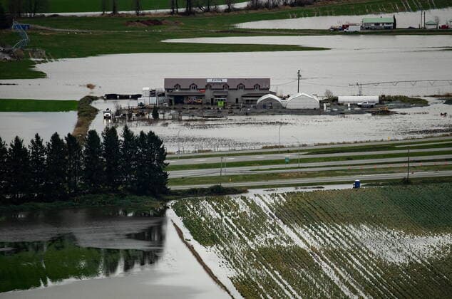 December 1, 2021, ABBOTSFORD, BC, CANADA: A greenhouse supply store and nursery surrounded by flooded farmland is seen in Abbotsford, B.C., on Wednesday, December 1, 2021. ABBOTSFORD CANADA  - ZUMAc35_ 20211201_zaf_c35_110 Copyright: xDarrylxDyckx